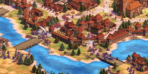 A Key Frame From Age Of Empires 2 Remastered Showing A Siege Of A City In Process