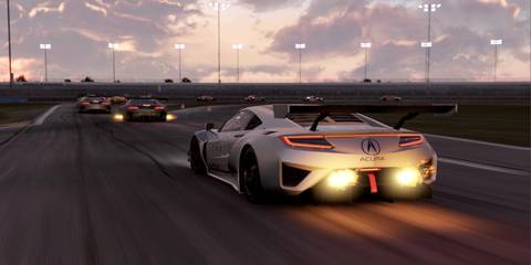 A Key Frame From Project Cars Showing A WHite Honda Acura Picking Up The Rear On A Straight Track