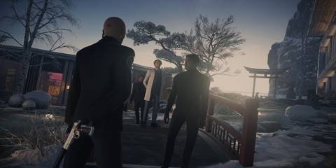 A Key Frame Showing Agent 47 Approaching An Enemy With A Hidden Firearm In Hitman World Of Assassination