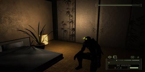 A Key Frame Showing Sam Fisher Hiding In A House From Splinter Cell Chaos Theory
