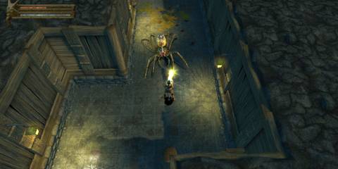 Baldur's Gate Dark Alliance fighting a big spider