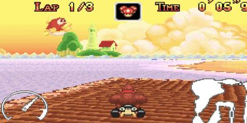 dk riding on a bridge on mario kart: super circuit