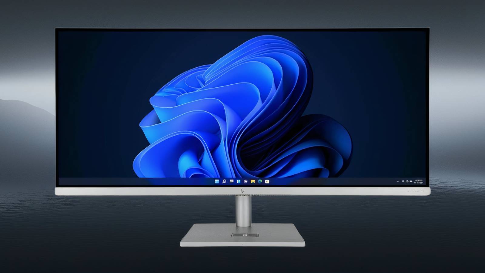 Image of an AIO computer on a black marble backgroud.