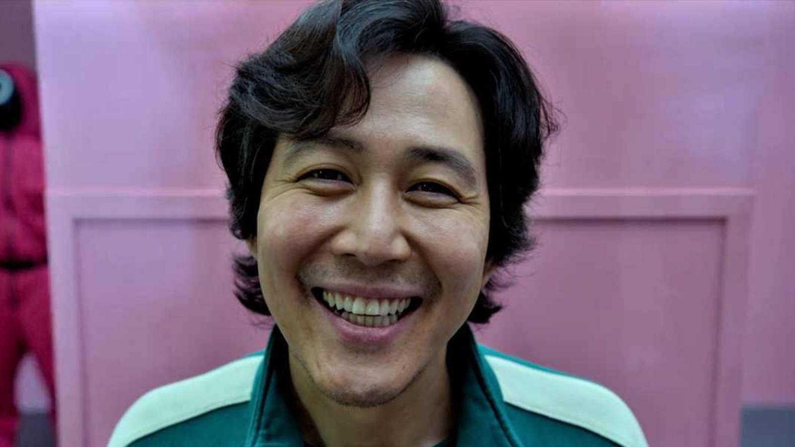 Gi-Hun takes his photo in Squid Game Season 1.