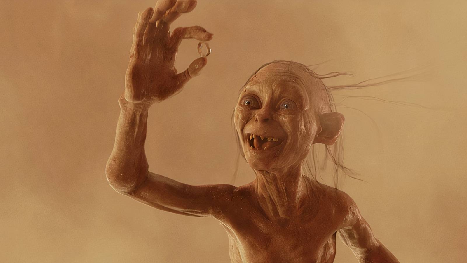 Gollum holds the ring 