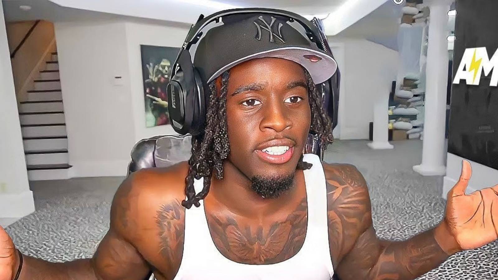 kai cenat sets room on fire with fireworks