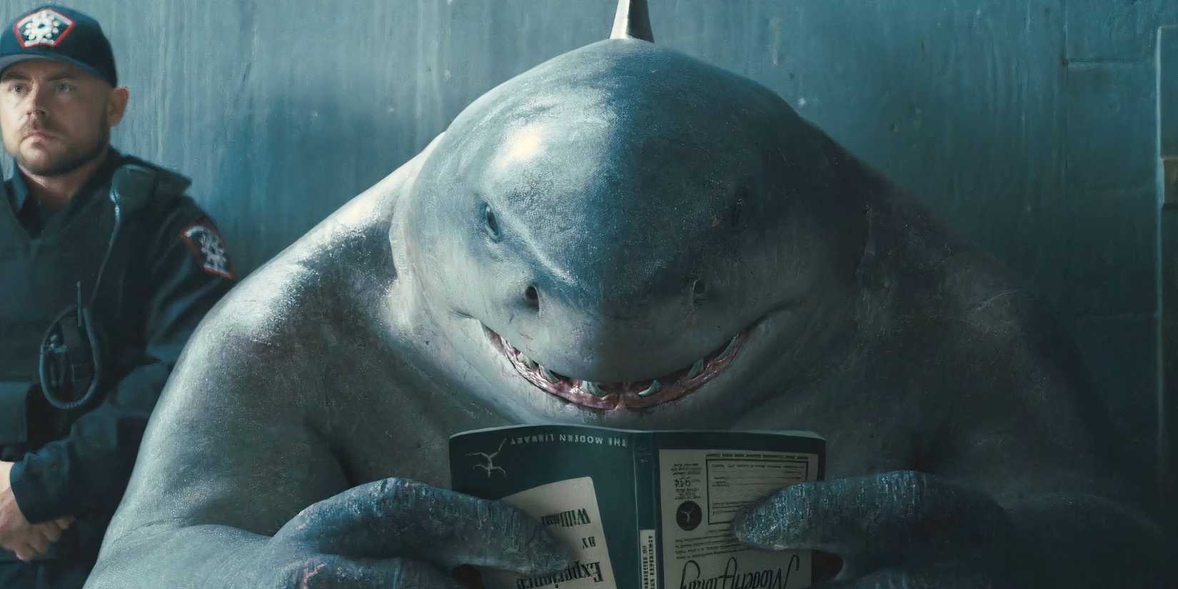 King Shark reading The Suicide Squad 2021