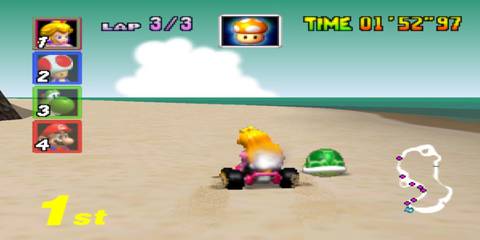 peach driving with a green shell