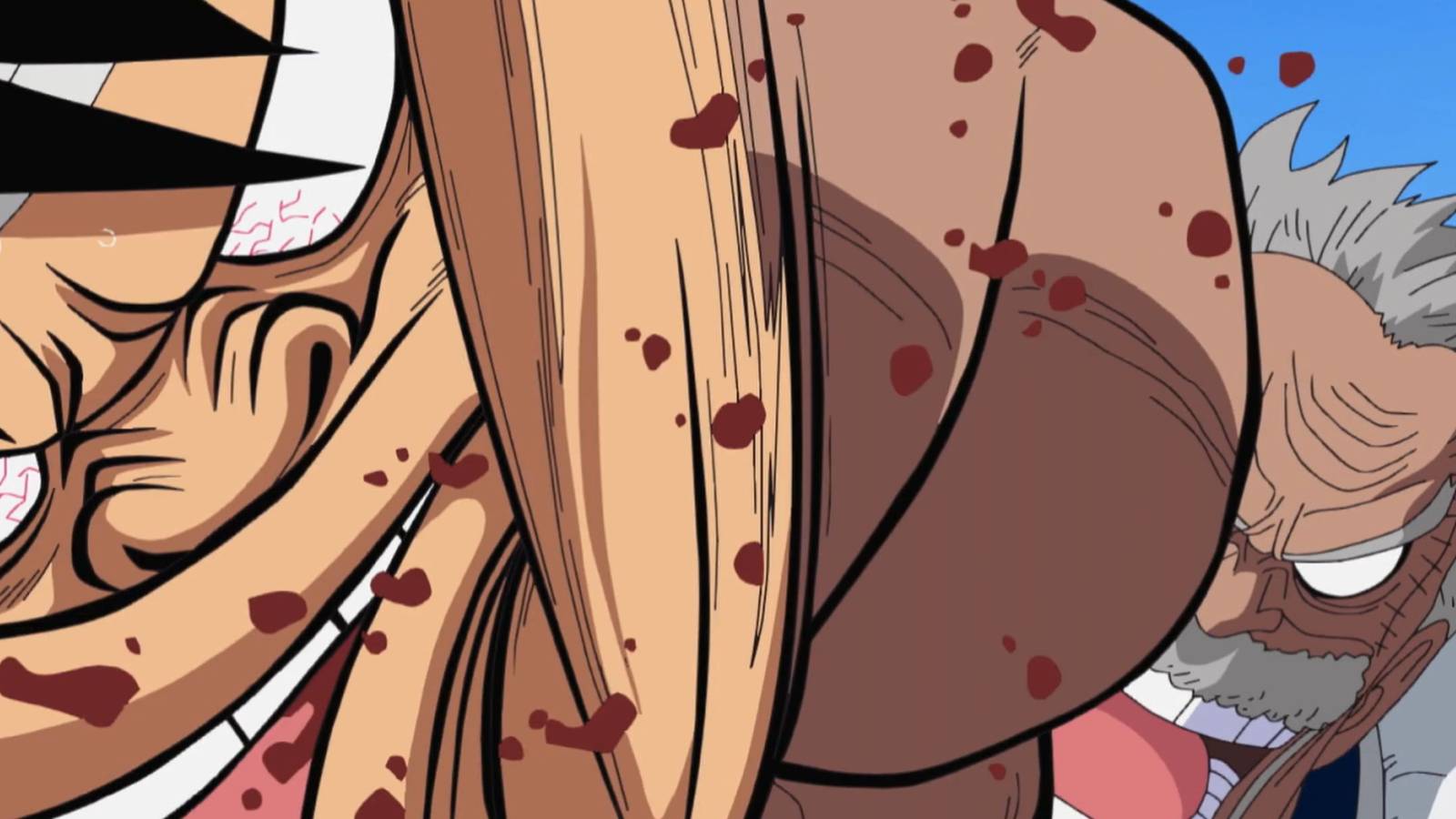 Garp punching Luffy in the face, bypassing his immunity to blunt force