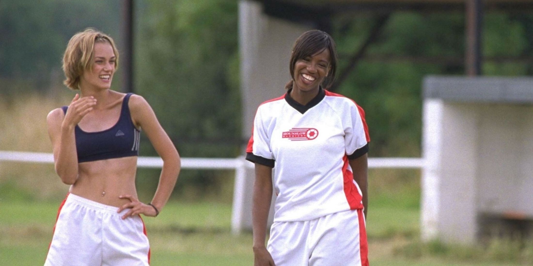 Jules on the football pitch with another player