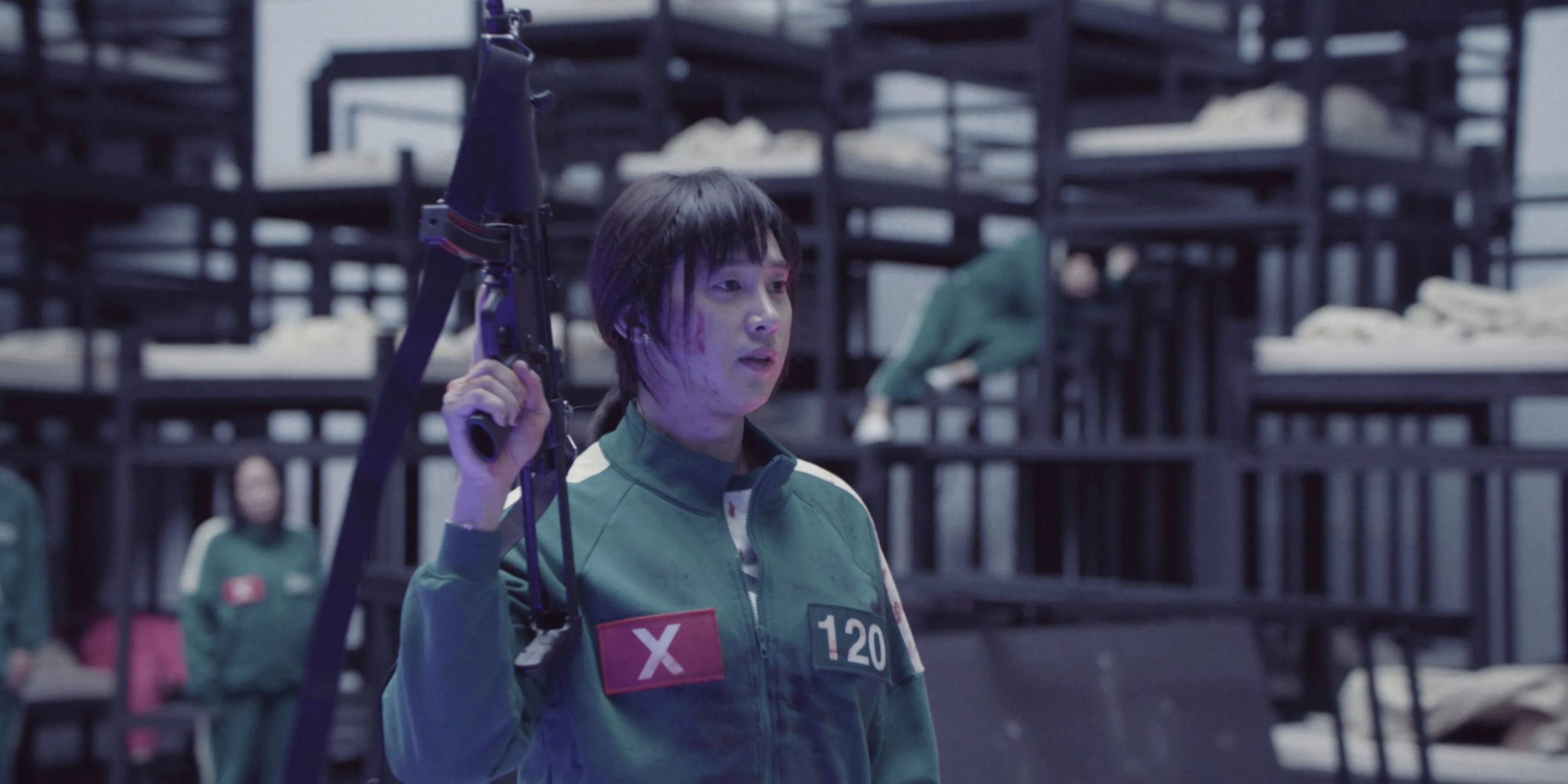 Cho Hyun-Ju using a weapon in Squid