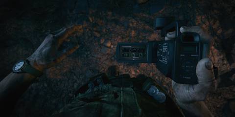 a man holding a video camera