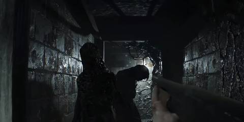 ethan fighting the mold monsters