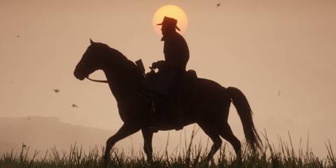 silhouette of Arthur riding a horse in Red dead redemption 2