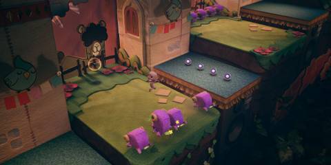 Sackboy jumping around in one of the levels in Sackboy: A Big Adventure