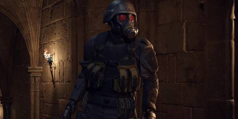 Hunk standing next to a torch 