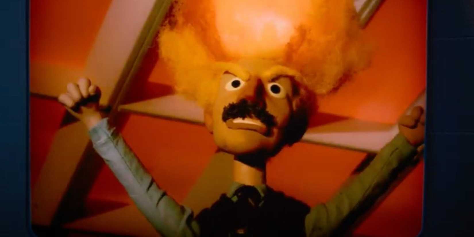 An animated version of Irving (John Turturro) from the "Lumon is Listening" video in Severance season 2 episode 1