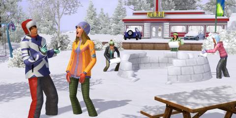 Sims enjoy a snowball fight outside a diner in The Sims 3 Seasons expansion