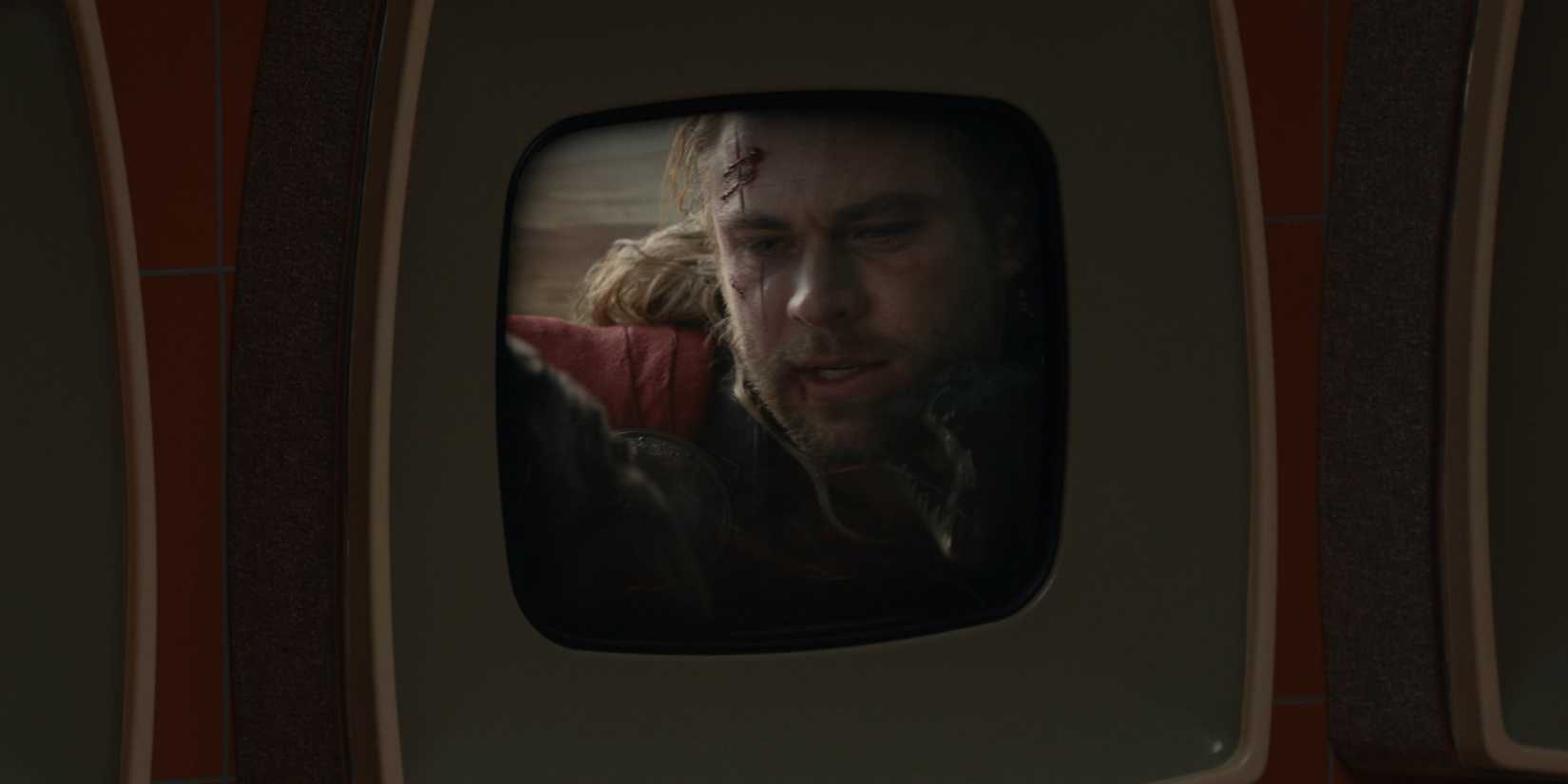 thor holding deadpool