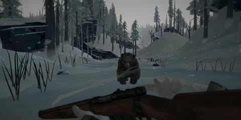 Bear charging at player with gun in The Long Dark