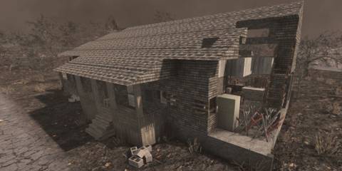 7 Days to Die damaged house with some defenses