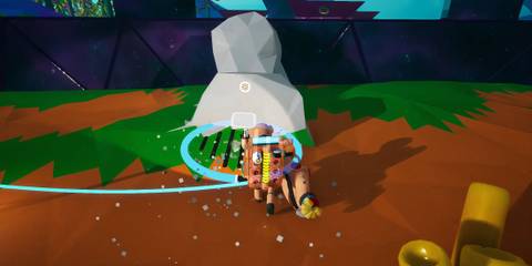 The player terraforming in Astroneer to reach a high spot
