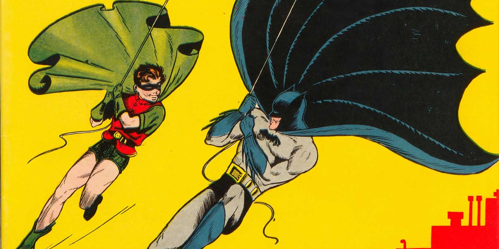 Batman and Robin swinging through Gotham in Batman #1