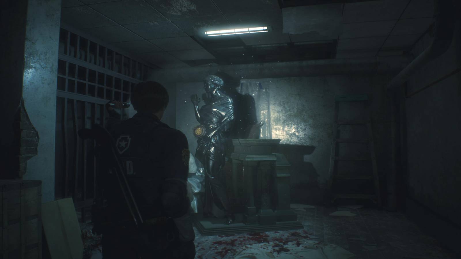 Leon Standing In Front Of The Maiden Statue 