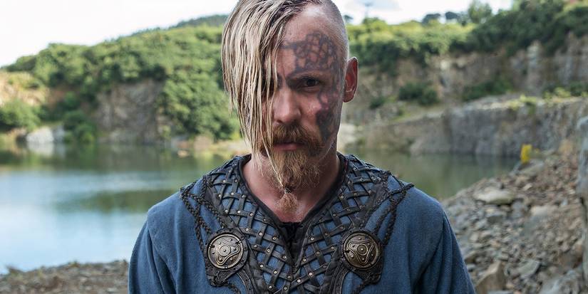 Halfdan Vikings looking on by lake