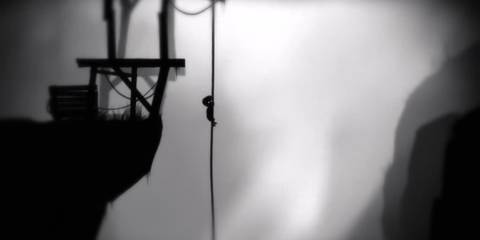 The player descending a rope in Limbo