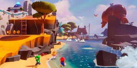 Mario + Rabbids Sparks of Hope Mario and the rabbids running on a beach