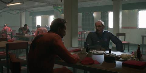 8 Best Horror Games That Focus on Survival Over Combat, Ranked two men sit in a canteen