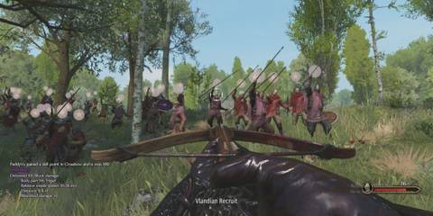 Player aiming crossbow towards their men