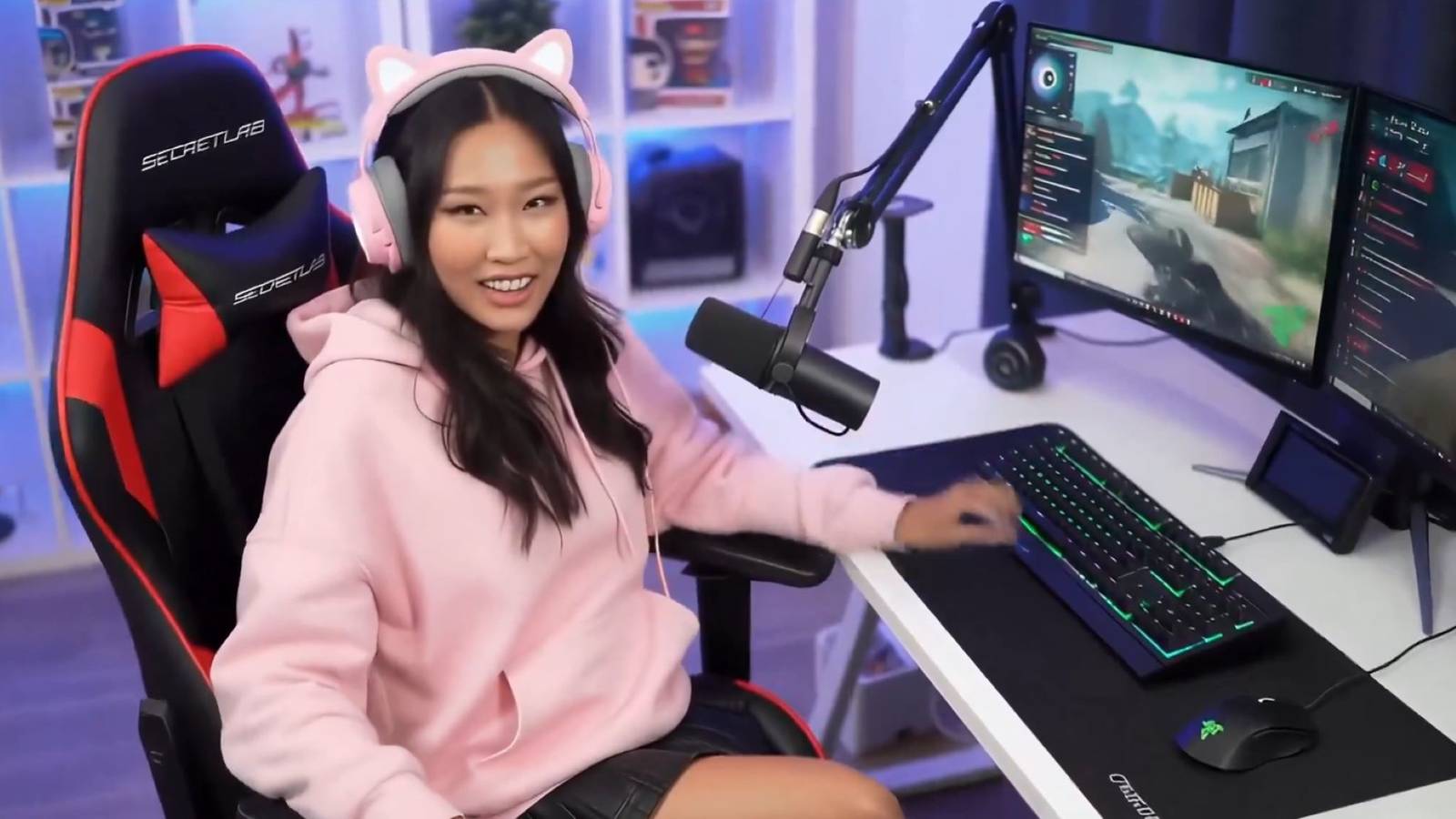 female twitch streamer made with ai sitting in front of a pc