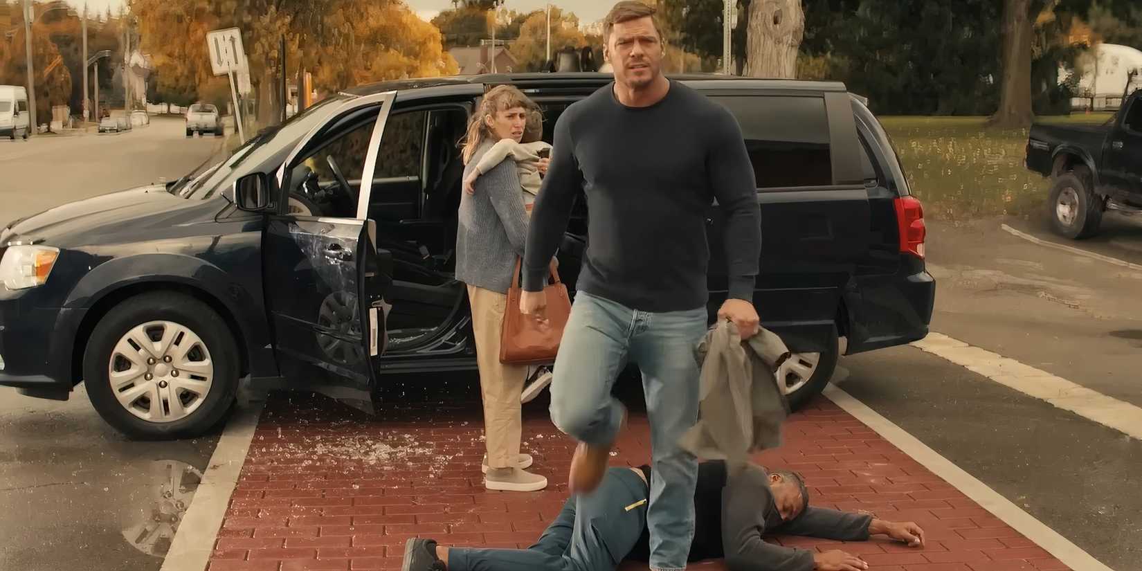 Reacher saving a mother and child from carjacker in Reacher