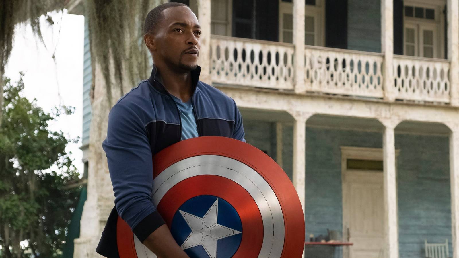 Sam Wilson holding the shield 
