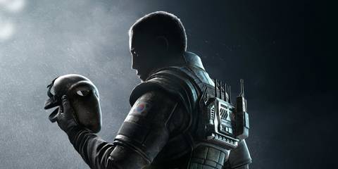 Vigil looking at his mask