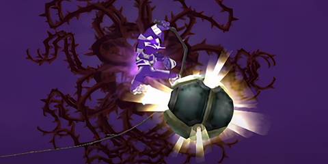 Wario using a whipe to slash a football 