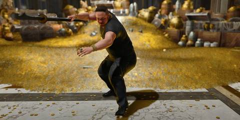 Raymond holding his staff