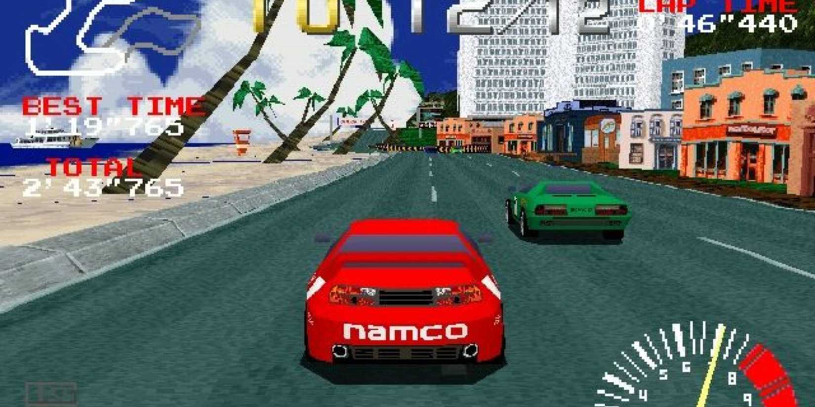 A red car driving through the beach.