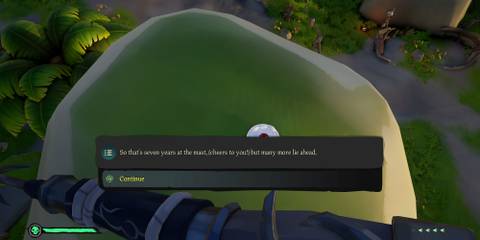 Anniversary cake riddle note at Lone Cove in Sea of Thieves