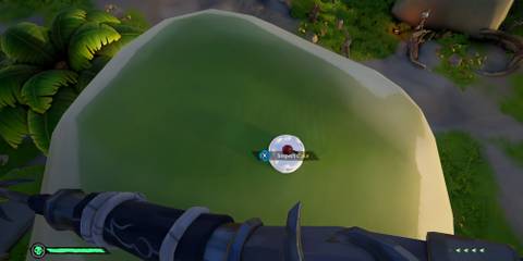 Anniversary cake location at Lone Cove in Sea of Thieves