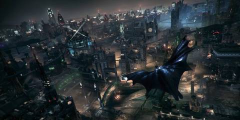 Batman gliding through Gotham City in Batman: Arkham Knight