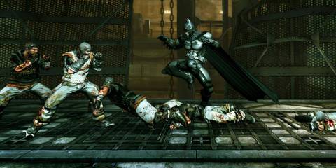 Batman fighting thugs in Batman: Arkham Origins - Blackgate