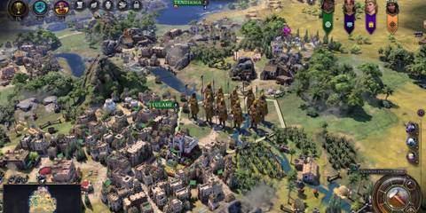 Civilization VII units gathering by a city