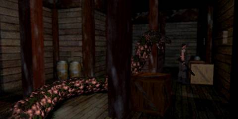 Fighting a giant snake as Chris in Resident Evil