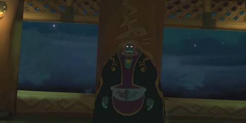 ganon standing in front of a window