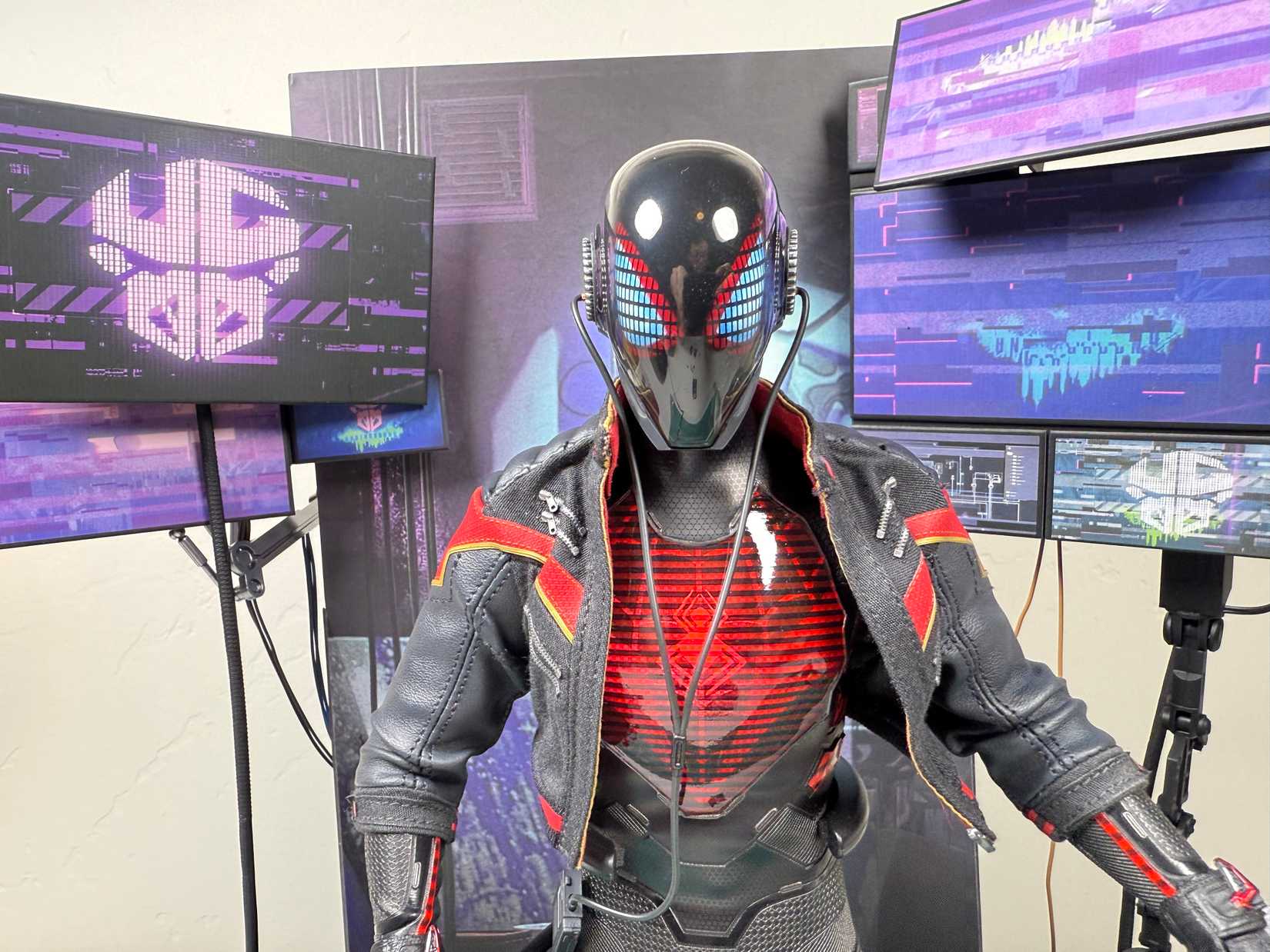 hot toys miles morales - light up statue in background