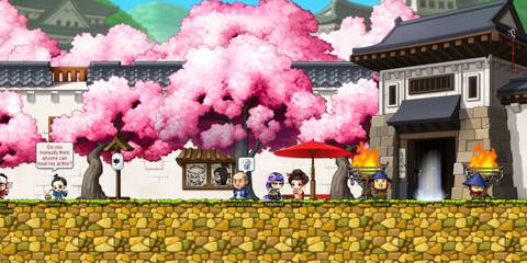 MapleStory characters standing under a cherry blossom tree