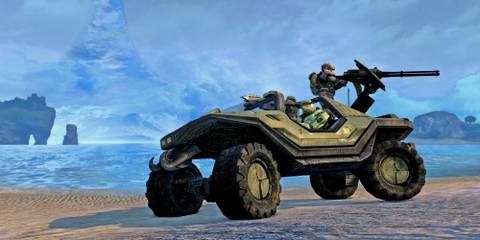 Master Chief and a teammate in a Warthog.